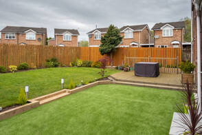 neatly installed artificial grass in a frontyard